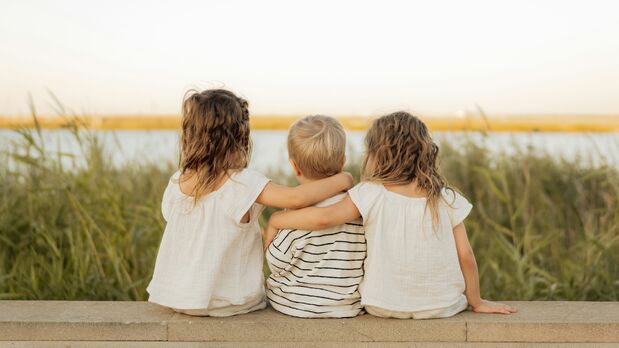 Foto von drei Kindern zum Weltkindertag